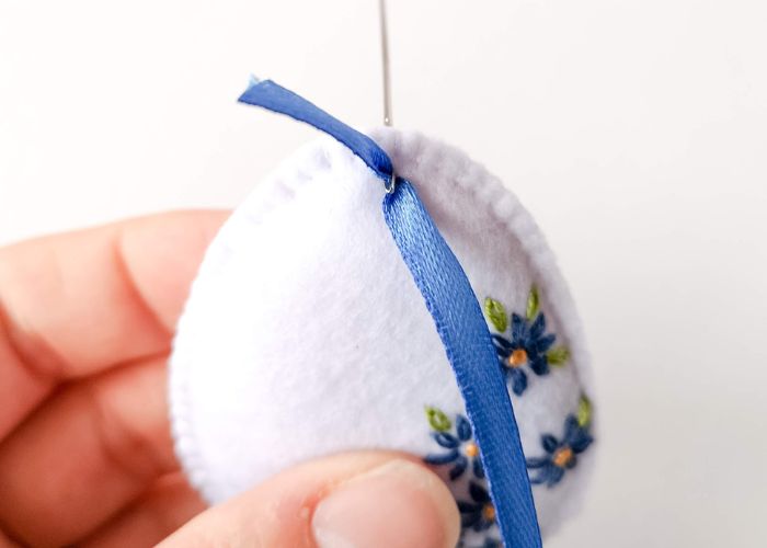 Add a ribbon to the felt ornament
