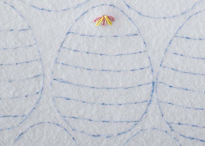 Add two more petals with Lazy daisy stitch