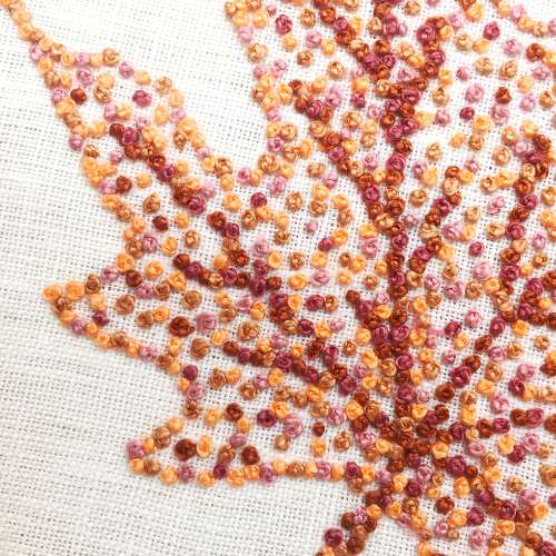 Autumn leave embroidered with French knots stitch in brown and light orange colors; french knot stitch techniques example2; French knot in embroidery example2; French knot guide example2; french knot stitch techniques example2; how to do a French Knot example2