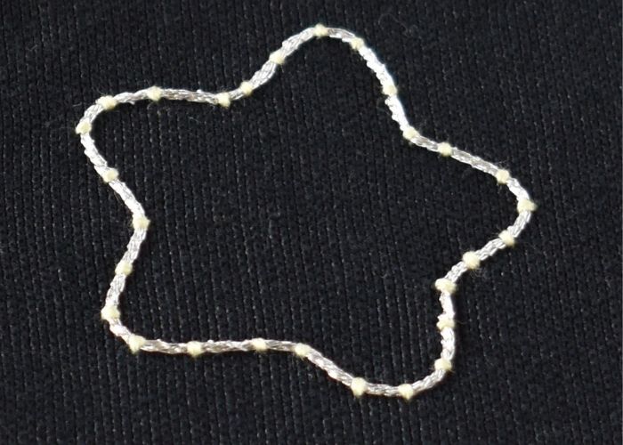 Couching Stitch Stern Stickerei